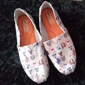 Bob's from Skechers memory foam slip ons. W/ dogs